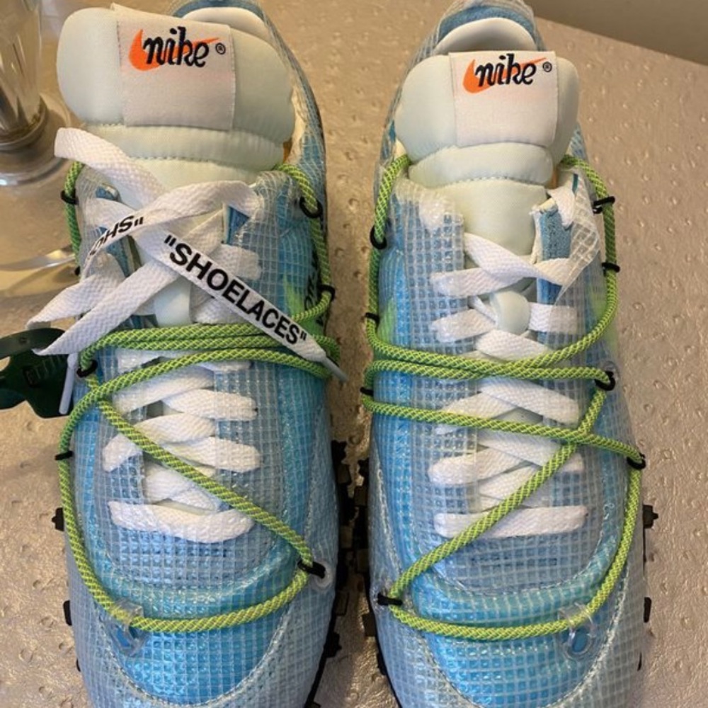 Woman size 8 Nike off white